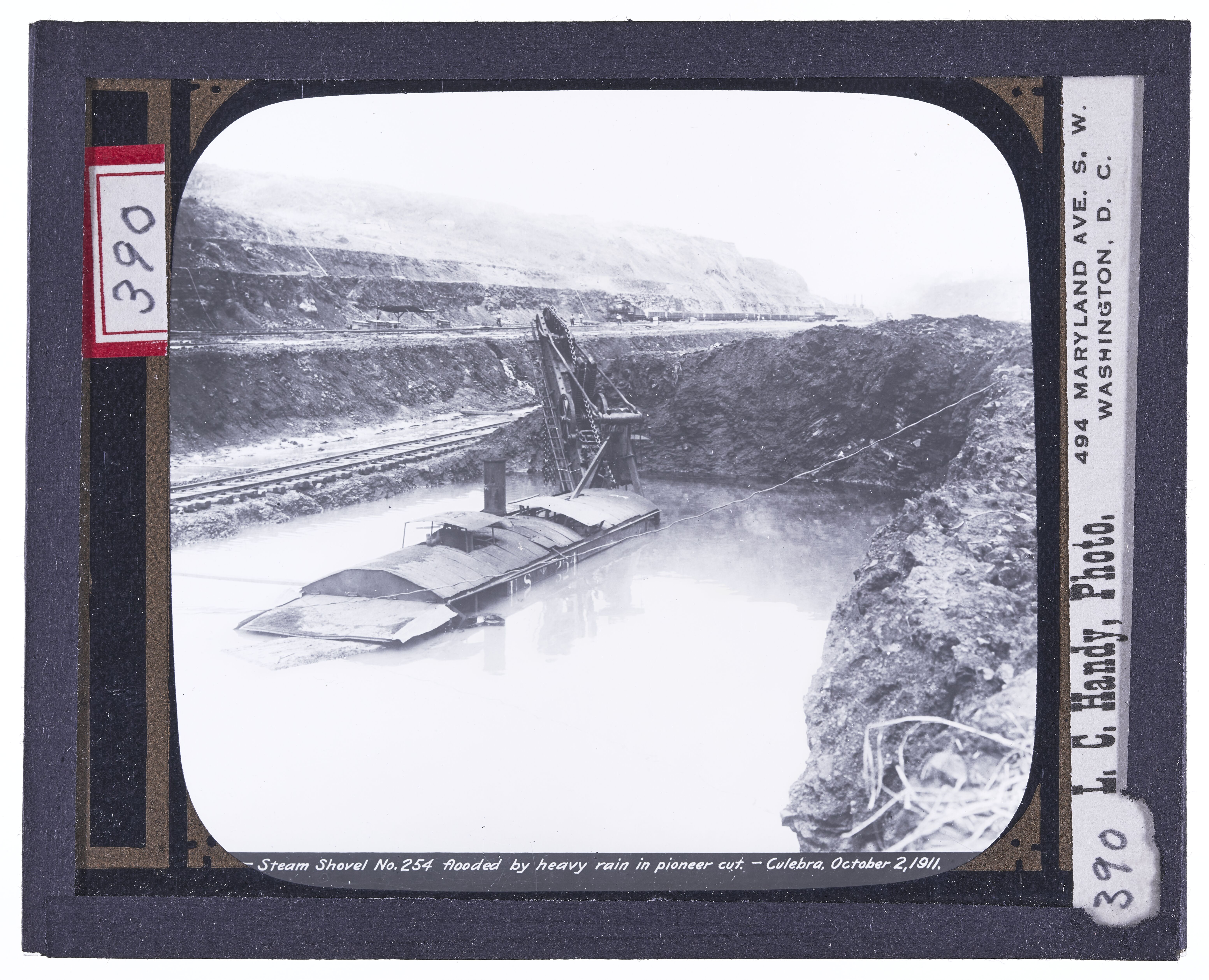 Steam Shovel No. 254 Flooded by Heavy Rain in Pioneer Cut, Culebra, October 2, 1911