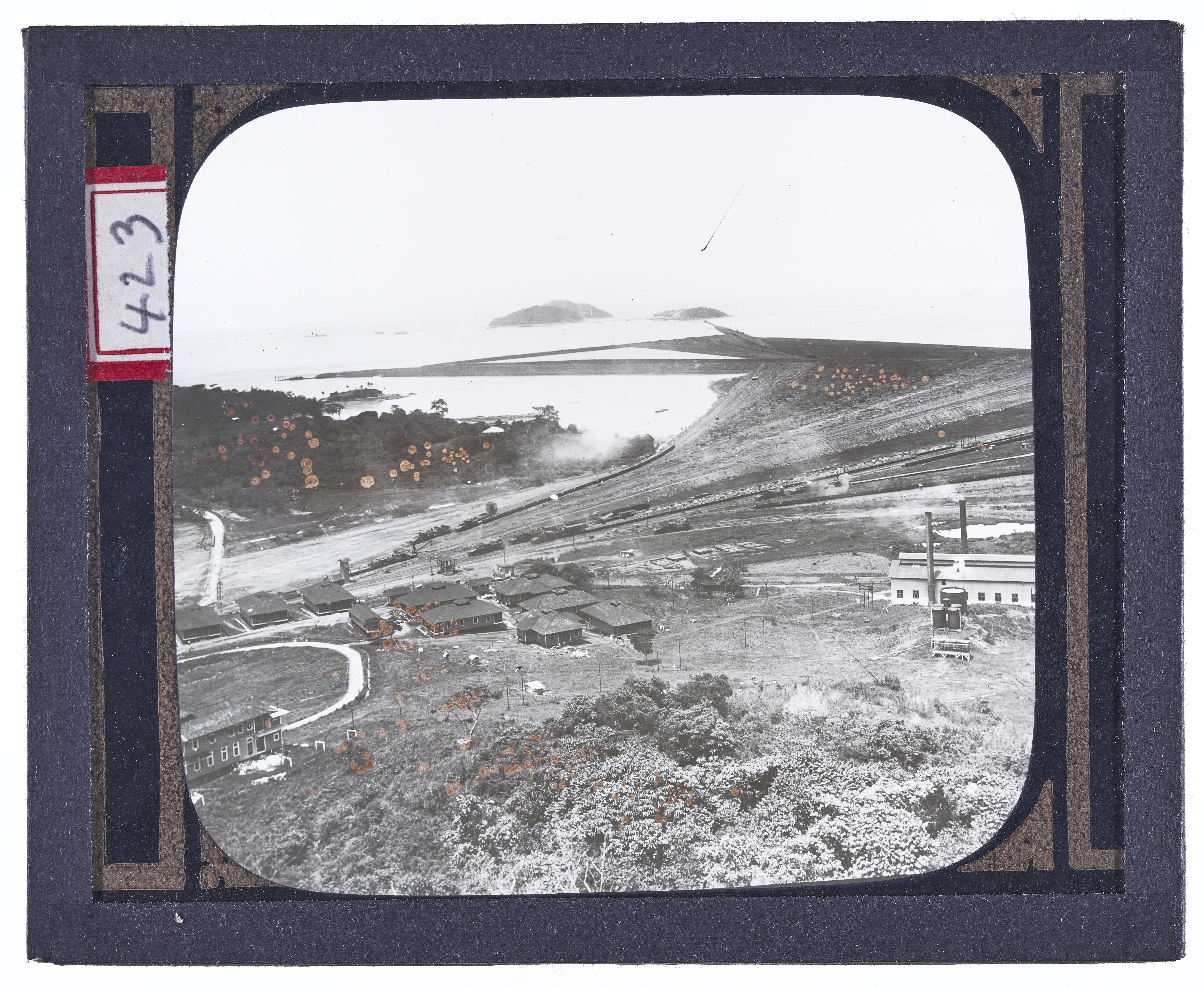 Unnamed picture of a small town on a hillside overlooking the ocean, apparently near one end of cana