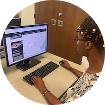 Thandeka Bango works at a computer on his project