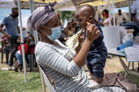 A mother and baby at a vaccine clinic in Africa. Photo from UNICEF