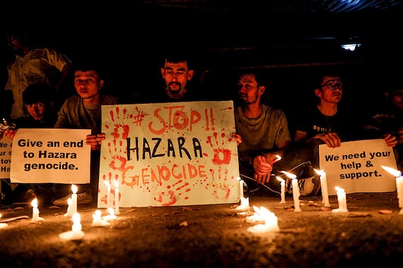 Protesters holding signs that say "Stop Hazara Genocide"