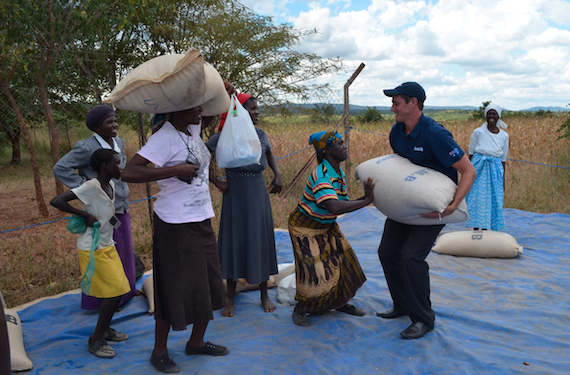 Relief workers delivering grain as part of an assistance mission in Zimbabwe
