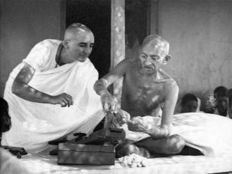 Mirabehn and Gandhi at the spinning wheel