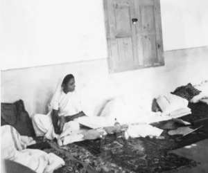 Amtul Salaam giving Gandhi a massage