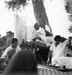 Gandhi and Amrit Kaur spinning